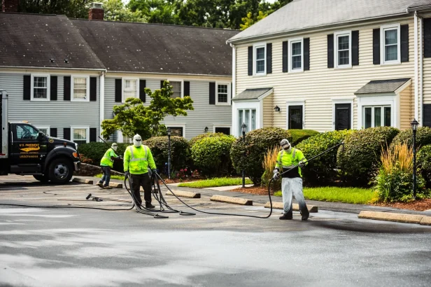 U.S. Pavement employees applying sealcoat