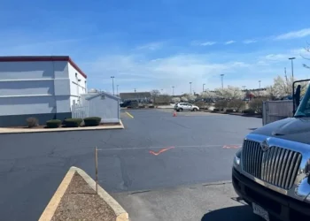 U.S. pavement working on parking lot of papa ginos