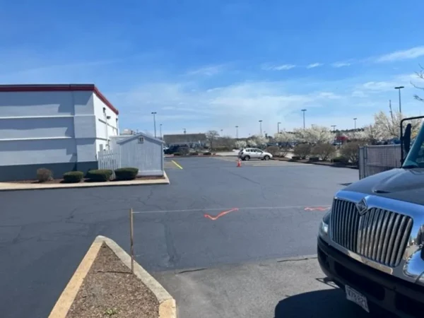 U.S. pavement working on parking lot of papa ginos