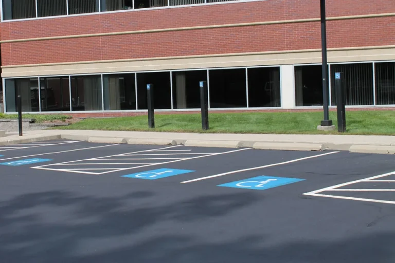 handicapped parking lot spots in front of a building