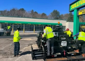 U.S. pavement employees working on a Sullivan tire